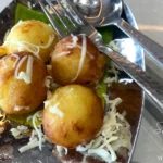 Cheese paniyaram - shree gomateshwara bhawan vapi