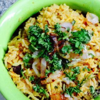 Chicken Pulao or Curried Chicken & Rice One Pot Meal. Serve garnished with fresh, chopped coriander.