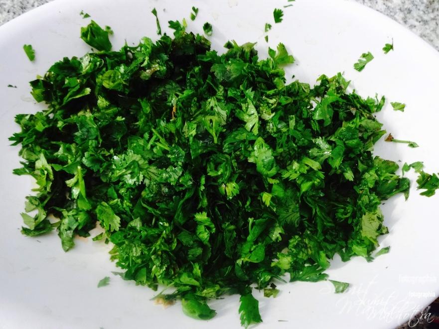 Finely chop two bundles of fresh coriander leaves