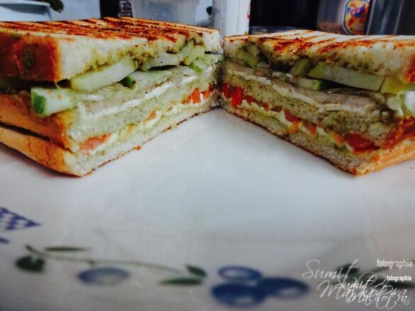 Split Bombay Sandwich into two & serve