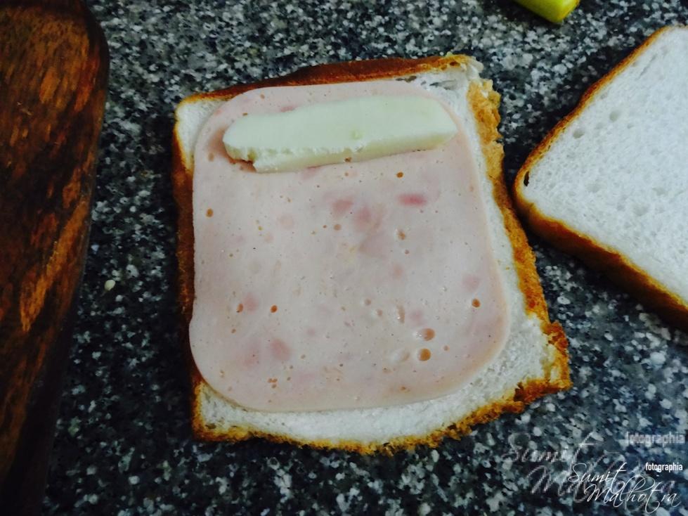Place a slice of chicken ham and cheese as shown