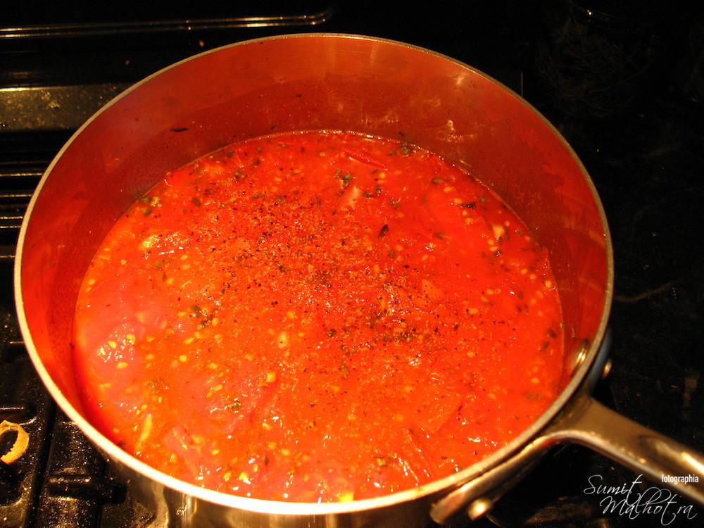 Simmer the tomato gravy till done