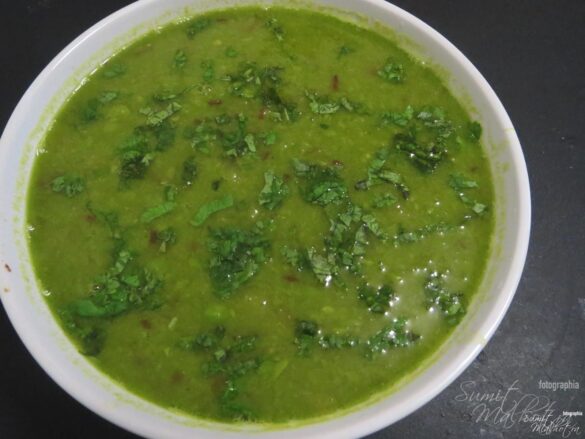 Serve matar ka nimona recipe hot in a bowl and garnish with coriander leaves