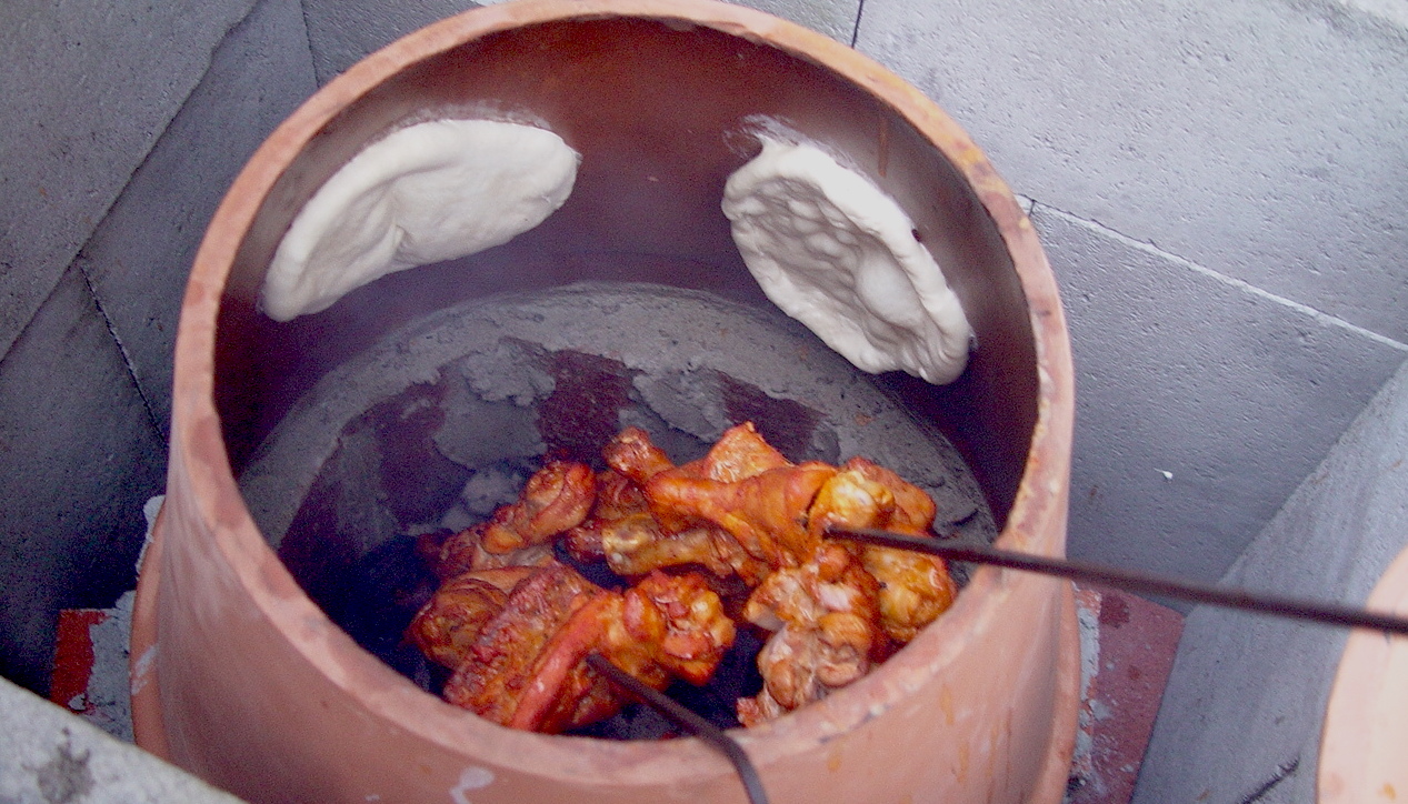 Tandoori chicken & roti in a tandoor