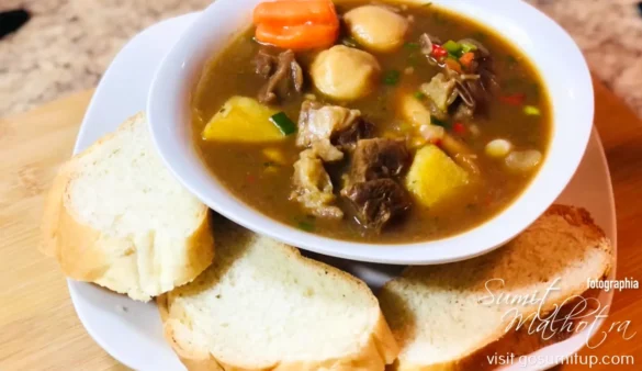 Antiguan goat water served with bread