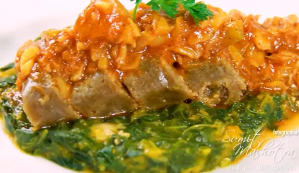 Ducana placed on saltfish and topping