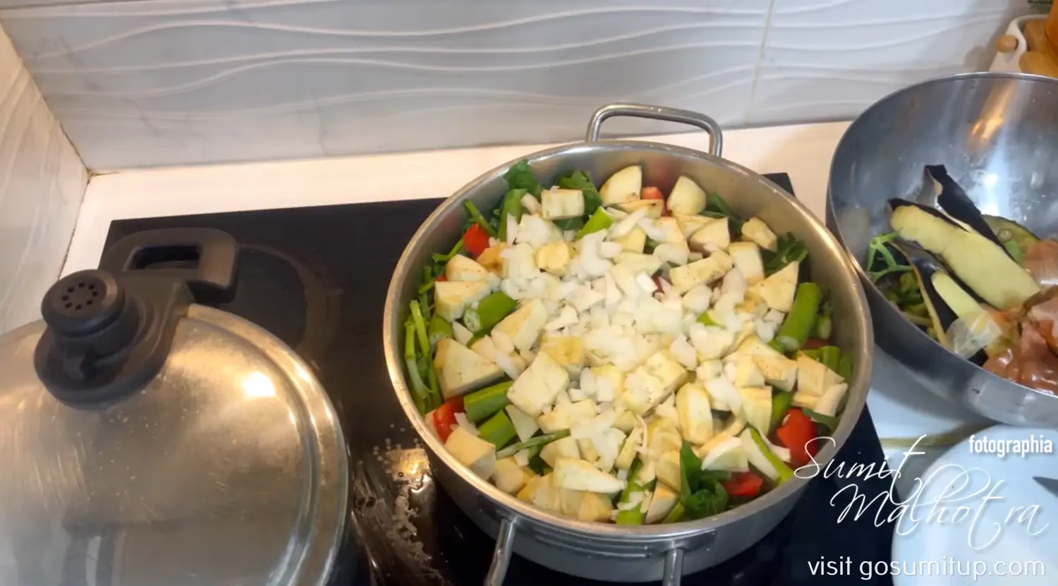 Okra & eggplant added to calulu stew