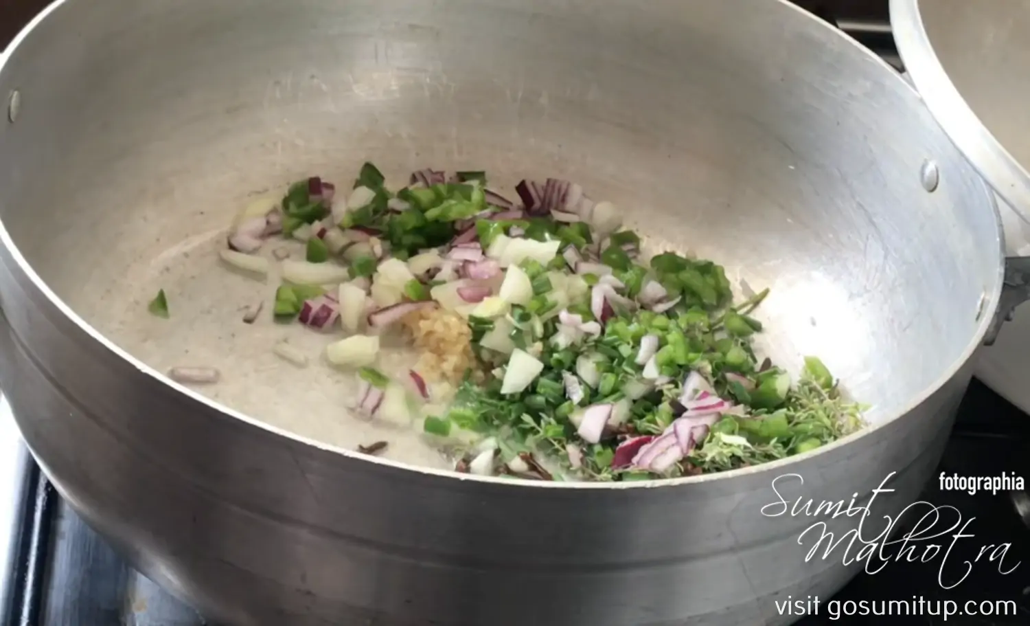 Seasoning & vegetables being sauteed