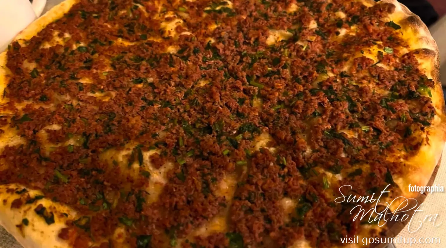 Lavash served like a pizza with mince meat