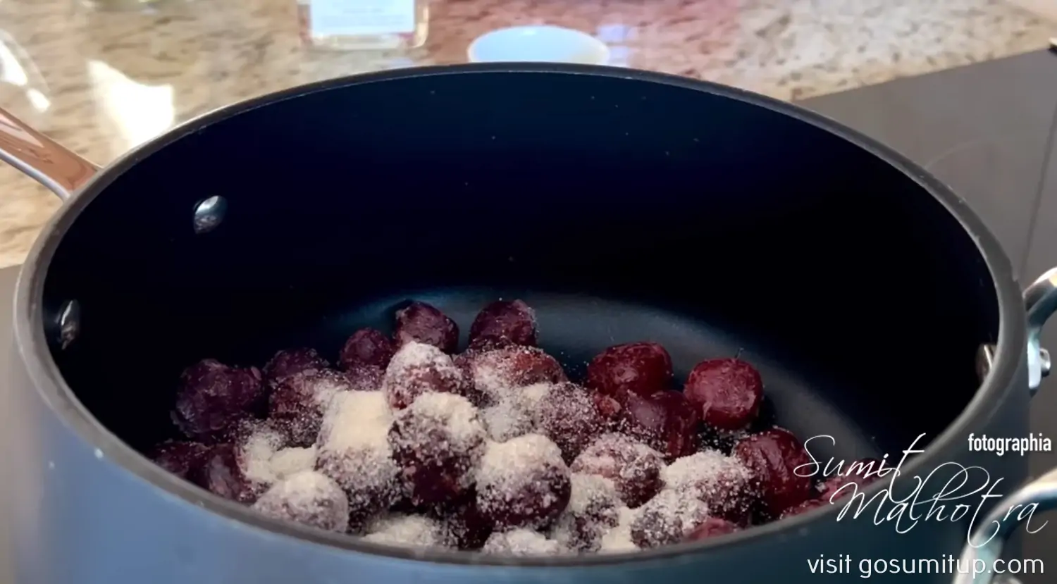 Making of berry jam for salzburger nockerln