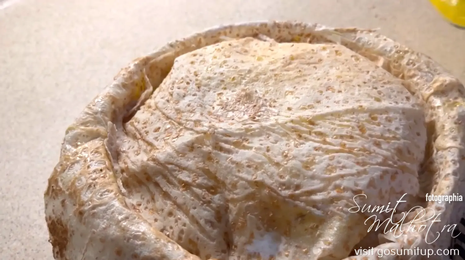 Pre baked shah plov is wrapped with lavash