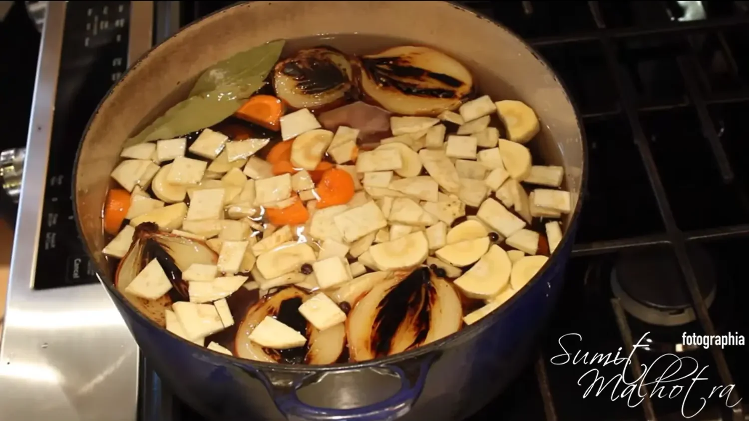 Ready to be boiled - root vegetables, bay leaves, spices & browned onions with sirloin rump cap for tafelspitz