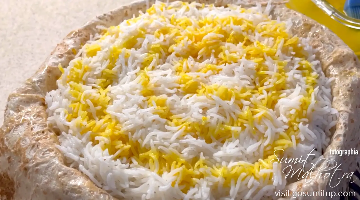 Saffron water added to the top layer