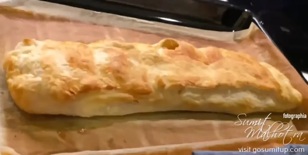 Mastering the apfelstrudel—the physics of viscoelastic pastry stretching Viennese apfelstrudel out of the oven