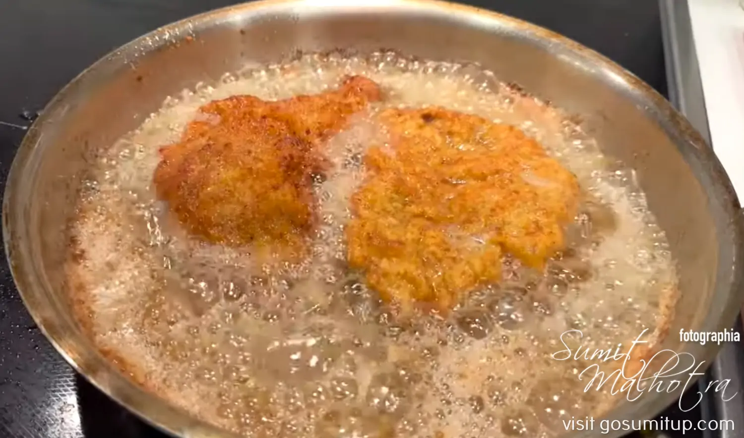 Wiener schnitzel being fried