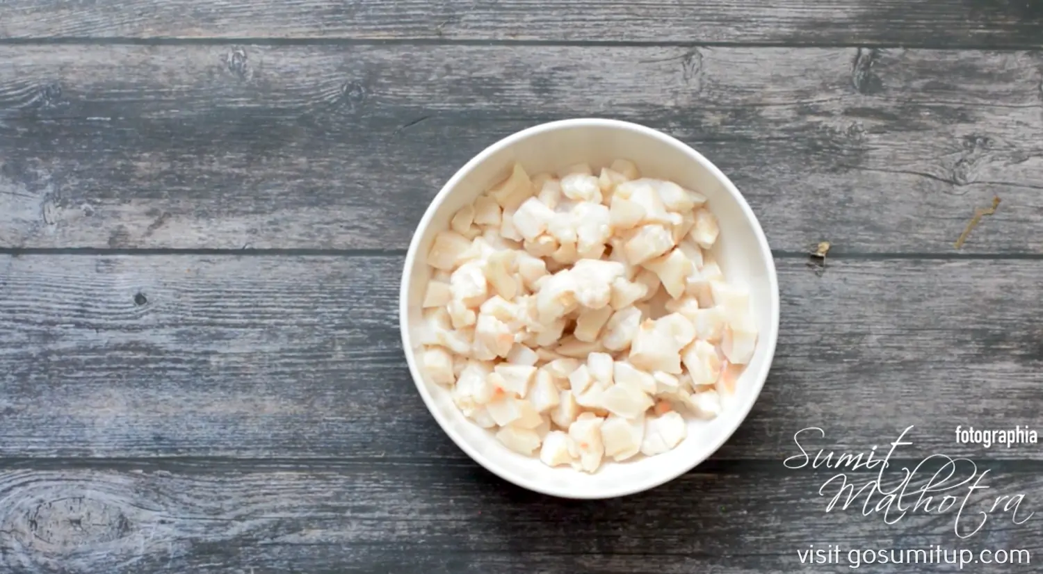 Finely dice conch meat for conch salad